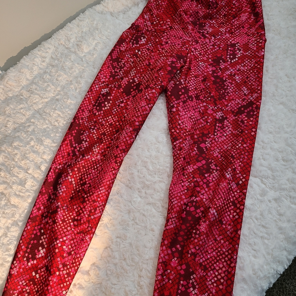 Emily Hsu - red, snake skin patterned leggings. Size S